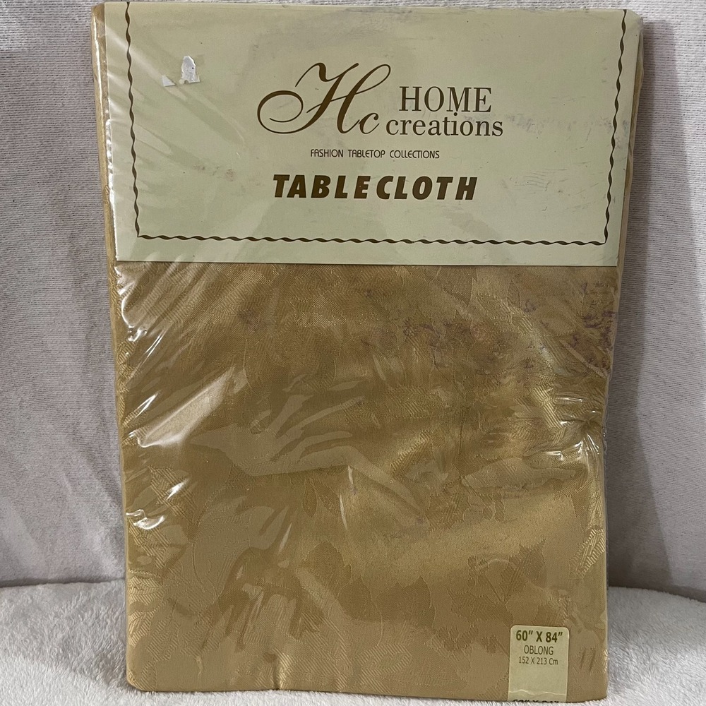 Home Creations Tabletop Collections Gold Poinsettia & Holly Tablecloth (60x84)